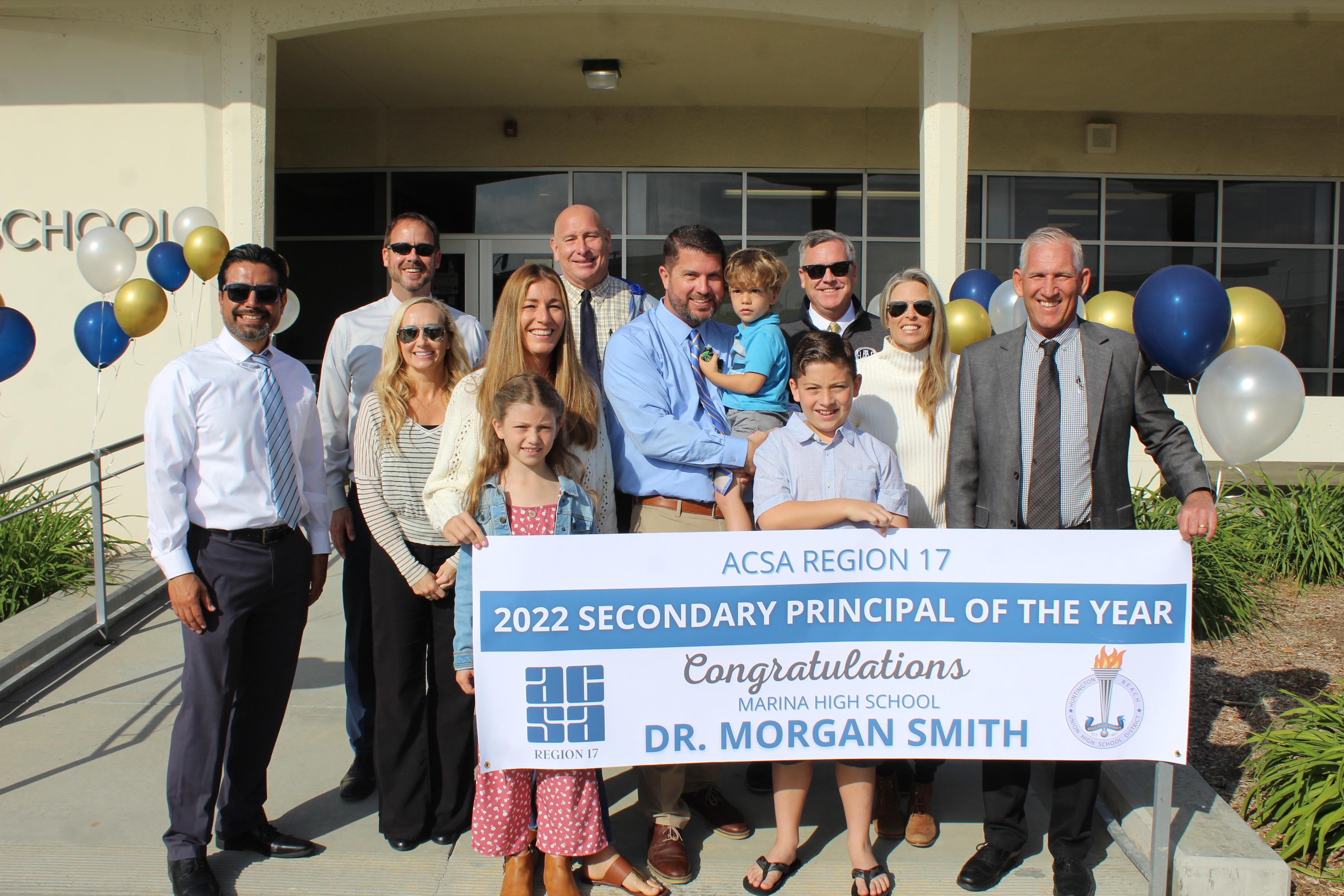 Dr. Morgan Smith with family and administrators 